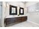 Spa-like bathroom with double vanity and large mirrors at 931 Bayshore Rd, Nokomis, FL 34275