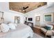 Bright bedroom with wood ceiling and ensuite bathroom access at 931 Bayshore Rd, Nokomis, FL 34275