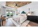 Main bedroom with water views and a gorgeous wood ceiling at 931 Bayshore Rd, Nokomis, FL 34275