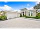 Three-car garage and paver driveway at 931 Bayshore Rd, Nokomis, FL 34275