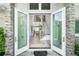 Double front doors open to a spacious foyer at 931 Bayshore Rd, Nokomis, FL 34275