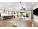 Bright and airy living room with water views, hardwood floors and comfortable seating at 931 Bayshore Rd, Nokomis, FL 34275