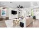 Spacious living room with hardwood floors, neutral colors, and ample natural light at 931 Bayshore Rd, Nokomis, FL 34275