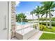 Inviting pool area with a spacious deck and outdoor shower at 931 Bayshore Rd, Nokomis, FL 34275