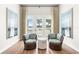 Peaceful sitting area with French doors leading to water view at 931 Bayshore Rd, Nokomis, FL 34275