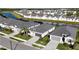 Aerial view of houses and a canal in a residential area at 11380 Burgundy Dr, Venice, FL 34293