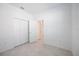 Bedroom with a spacious closet and neutral decor at 11380 Burgundy Dr, Venice, FL 34293