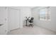 Bright office space with a window, closet and a modern desk setup for a productive work environment at 11380 Burgundy Dr, Venice, FL 34293