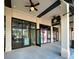 Inviting retail storefront featuring glass windows displaying interior designs and storefront sign at 11380 Burgundy Dr, Venice, FL 34293