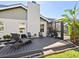 Spacious composite deck with lounge chairs and surrounding landscaping at 120 Lookout Point Dr, Osprey, FL 34229