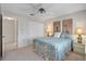 This bedroom includes a large closet and light-colored walls, offering a serene and inviting personal space at 148 Inlets Blvd # 148, Nokomis, FL 34275