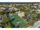 Aerial view of community tennis courts and pool area at 148 Inlets Blvd # 148, Nokomis, FL 34275