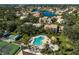 Community pool and surrounding recreational areas at 148 Inlets Blvd # 148, Nokomis, FL 34275