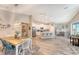 Farmhouse style dining table with blue and white chairs at 14924 Sora Way, Bradenton, FL 34212
