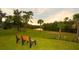 Scenic riverfront property with a peaceful bench overlooking the water at 14924 Sora Way, Bradenton, FL 34212