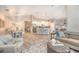 Open concept kitchen features island, stainless steel appliances, and white shaker cabinets at 14924 Sora Way, Bradenton, FL 34212
