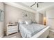 Spacious main bedroom with ceiling fan, white dresser, and large bed at 14924 Sora Way, Bradenton, FL 34212