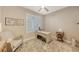 Bright home office featuring a large window and comfortable armchair at 14924 Sora Way, Bradenton, FL 34212