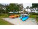 Community kayak storage with various kayaks available for use at 14924 Sora Way, Bradenton, FL 34212