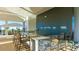Outdoor bar with stone facade and seating for guests at 15813 6Th E Ave, Bradenton, FL 34212