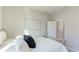 Light and airy bedroom with a double bed and access to a bathroom at 15813 6Th E Ave, Bradenton, FL 34212