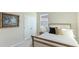 Cozy bedroom with a queen-size bed and neutral color scheme at 15813 6Th E Ave, Bradenton, FL 34212