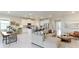 Open floor plan boasts a modern kitchen island and spacious Gathering room at 15813 6Th E Ave, Bradenton, FL 34212