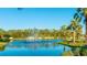 Serene lake with a fountain and lush landscaping at 15813 6Th E Ave, Bradenton, FL 34212