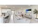 Open concept living area with kitchen and access to backyard at 15813 6Th E Ave, Bradenton, FL 34212