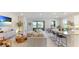 Open concept living area with kitchen, dining and water views at 15813 6Th E Ave, Bradenton, FL 34212