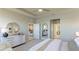 Main bedroom with access to the bathroom and walk-in closet at 15813 6Th E Ave, Bradenton, FL 34212
