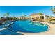 Resort-style pool with lounge chairs and a covered patio at 15813 6Th E Ave, Bradenton, FL 34212