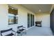 Relaxing screened patio with outdoor seating and grill at 15813 6Th E Ave, Bradenton, FL 34212
