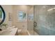 Contemporary bathroom featuring a glass shower with tile and updated fixtures at 1682 Hawthorne St, Sarasota, FL 34239