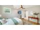 Tranquil bedroom with a TV, ensuite, and natural lighting at 1682 Hawthorne St, Sarasota, FL 34239