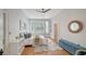 Cozy bedroom featuring lots of natural light, a bed with stylish decor, and hardwood floors at 1682 Hawthorne St, Sarasota, FL 34239