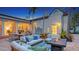Beautiful outdoor patio with fire pit, fountains and outdoor furniture creating an ideal space for dining and lounging at 1682 Hawthorne St, Sarasota, FL 34239