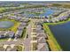 Aerial view of a neighborhood with houses and lakes at 17113 Reserva Dr, Bradenton, FL 34211