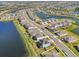Aerial view of a neighborhood with houses and lakes at 17113 Reserva Dr, Bradenton, FL 34211