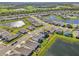 Aerial view of a neighborhood with houses and lakes at 17113 Reserva Dr, Bradenton, FL 34211