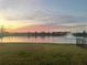 Pond view with fountain at sunset at 17113 Reserva Dr, Bradenton, FL 34211