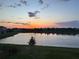 Serene sunset view over the pond at 17113 Reserva Dr, Bradenton, FL 34211