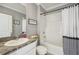 Bathroom with bathtub, shower, and granite countertop at 17113 Reserva Dr, Bradenton, FL 34211