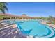 Resort-style pool with ample deck space and lounge chairs at 17113 Reserva Dr, Bradenton, FL 34211