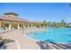 Large community pool with plenty of lounge chairs and a spacious deck at 17113 Reserva Dr, Bradenton, FL 34211