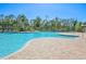Relaxing pool area with plenty of lounge chairs for sunbathing at 17113 Reserva Dr, Bradenton, FL 34211