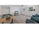 Game room with foosball table, sofa and access to backyard at 303 65Th St # A, Holmes Beach, FL 34217