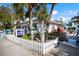 Anna Maria General Store with outdoor seating and a white picket fence at 303 65Th St # A, Holmes Beach, FL 34217