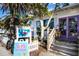 Dops Ice Cream shop with outdoor seating and a bike rack at 303 65Th St # A, Holmes Beach, FL 34217