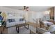 Living room features a light and airy feel with coastal decor and a comfy sofa at 303 65Th St # A, Holmes Beach, FL 34217